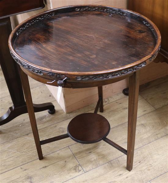 A Chinese hardwood circular galleried top table W.59cm